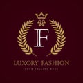 Luxury Fashion calligraphic crown and key letter `F` monogram logo Royalty Free Stock Photo