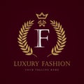 Luxury Fashion calligraphic crown key letter `F` monogram logo Royalty Free Stock Photo