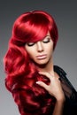 Luxury fashion trendy young woman with red curled hair. Girl w Royalty Free Stock Photo
