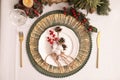 Luxury festive place setting with beautiful decor for Christmas dinner on white table, flat lay Royalty Free Stock Photo