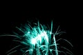 Luxury fireworks event sky show with turquoise glow stars