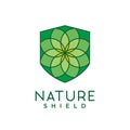 Luxury flower nature shield logo concept. flower icon and shield icon. eco company logo. nature conservation logo.