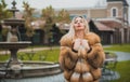 Luxury fur coat concept. Woman in furs