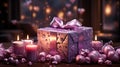 Luxury gift box with romantic candles on the table, festive still life, blurry background Royalty Free Stock Photo