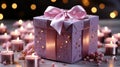 Luxury gift box with romantic candles on the table, festive still life, blurry background Royalty Free Stock Photo