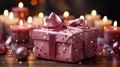 Luxury gift box with romantic candles on the table, festive still life, blurry background Royalty Free Stock Photo