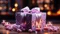 Luxury gift box with romantic candles on the table, festive still life, blurry background Royalty Free Stock Photo