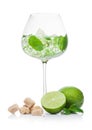 Luxury glass of Mojito summer alcoholic cocktail with ice cubes mint and lime on white background with cane sugar Royalty Free Stock Photo