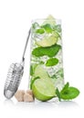 Luxury glass of Mojito summer alcoholic cocktail with ice cubes mint and lime on white with cane sugar and raw lime with steel Royalty Free Stock Photo