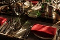 luxury glasses and plates with napkins on stylish decorated table with food at wedding reception. expensive catering Royalty Free Stock Photo