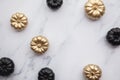 Luxury gold and black autumn pumpkin flat lay composition on a marble background