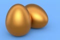 Luxury gold chicken eggs isolated on blue background