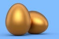 Luxury gold chicken eggs isolated on blue background