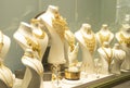 luxury gold jewelry in store window display Royalty Free Stock Photo