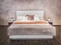 Luxury gray beige modern bed furniture with patterned bed with leather upholstery headboard . Soft brocade fabric bed