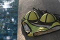 Luxury green neon triangle women bikini set near the swimming pool.