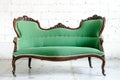 Luxury green vintage style armchair sofa couch in vintage room Royalty Free Stock Photo