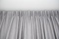 Luxury grey curtains with ring-top rail.