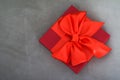 Luxury holiday red gift box with silk ribbon and bow, christmas or valentines day decor Royalty Free Stock Photo