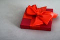 Luxury holiday red gift box with silk ribbon and bow, christmas or valentines day decor Royalty Free Stock Photo