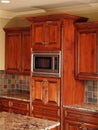 Luxury Home dark wood kitchen cabinet Royalty Free Stock Photo