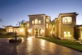 Luxury home at dusk Royalty Free Stock Photo