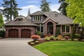 Luxury home exterior with brick and siding, double garage and large windows on facade. USA. Generative AI Royalty Free Stock Photo