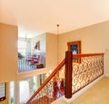 Luxury home hallway with metal railings. Royalty Free Stock Photo