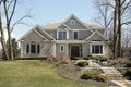 Luxury home with stone facade Royalty Free Stock Photo