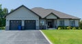 Luxury home on a sunny summer day in New Liskeard, Ontario Royalty Free Stock Photo