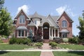 Luxury home with turret and arched entry Royalty Free Stock Photo