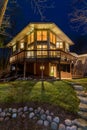 Luxury Home in the Woods at Night Royalty Free Stock Photo