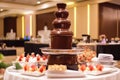 luxury hotel banquet with chocolate fountain and fondue station for dessert