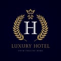 Luxury Hotel crown and key letter `H` monogram logo Royalty Free Stock Photo