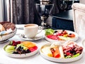 Luxury hotel and five star room service, various food platters, bread and coffee as in-room breakfast for travel and Royalty Free Stock Photo