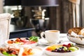 Luxury hotel and five star room service, various food platters, bread and coffee as in-room breakfast for travel and Royalty Free Stock Photo