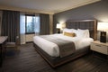 a luxury hotel room with king-size bed and plush pillows Royalty Free Stock Photo