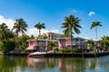 Luxury house apartment at summertime. Travel to bay at Florida neighborhood. Summer vacation in tropical residential Royalty Free Stock Photo