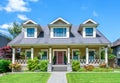 Luxury house with beautiful landscaping on a sunny day Royalty Free Stock Photo