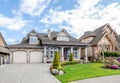 Luxury house with beautiful landscaping on a sunny day Royalty Free Stock Photo