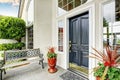 Luxury house entry way exterior with concrete floor porch. Royalty Free Stock Photo