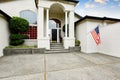 Luxury house exterior with concrete floor porch with columns Royalty Free Stock Photo