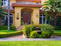 Luxury house with large frontyard and decorative fountain