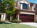 Luxury house with large wooden garage door