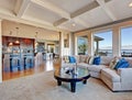 Luxury house with open floor plan. Coffered ceiling, carpet and Royalty Free Stock Photo