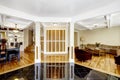 Luxury interior. Foyer with black shiny tile floor, columns and Royalty Free Stock Photo