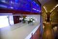 Luxury interior of kitchen in the modern private business jet Royalty Free Stock Photo