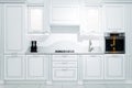 Luxury kitchen interior in white and blue tones Royalty Free Stock Photo