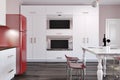 Luxury kitchen with a marble table, red fridge Royalty Free Stock Photo