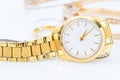 Luxury lady gold watch on white